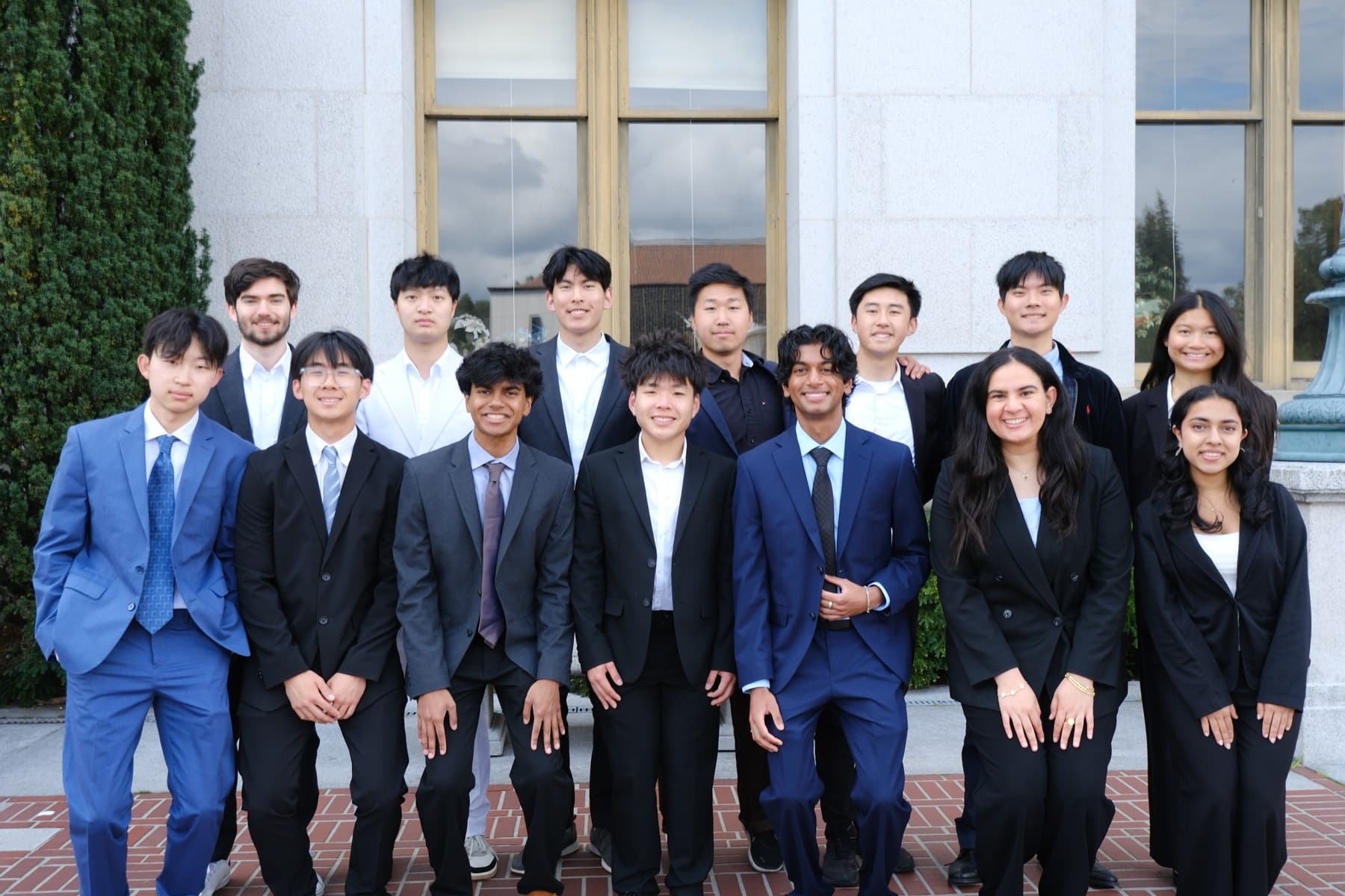 Members of the Acadev committee gathered for a group photo outside a UC Berkeley campus building