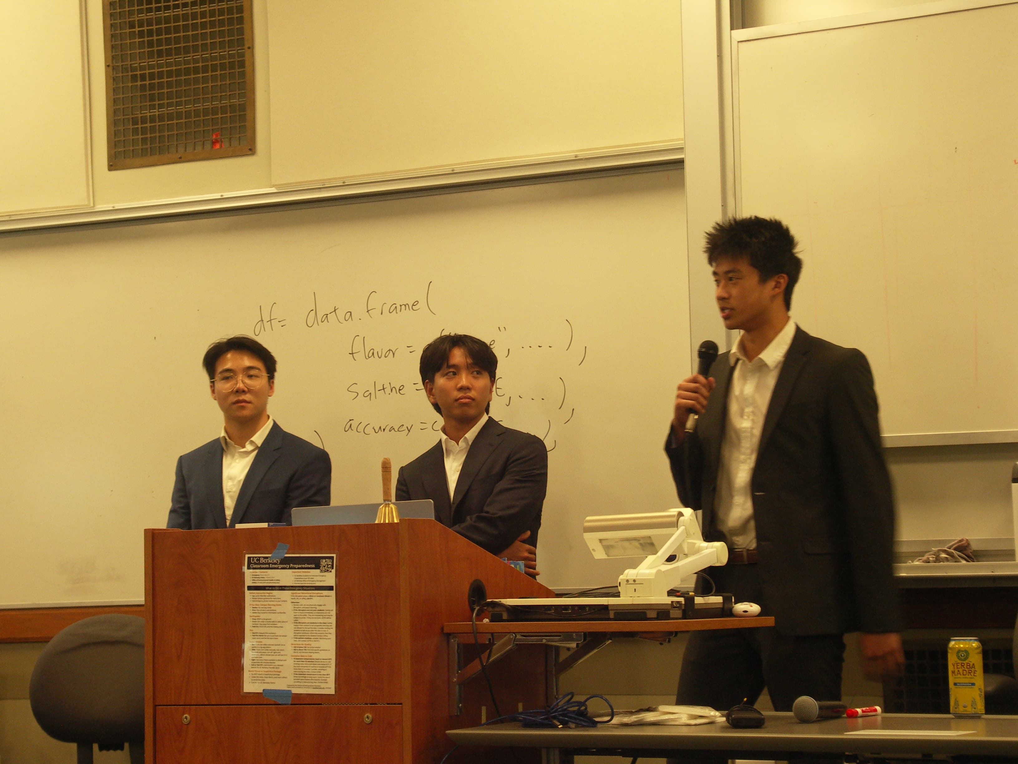Consulting members speaking on an alumni panel during a committee meeting