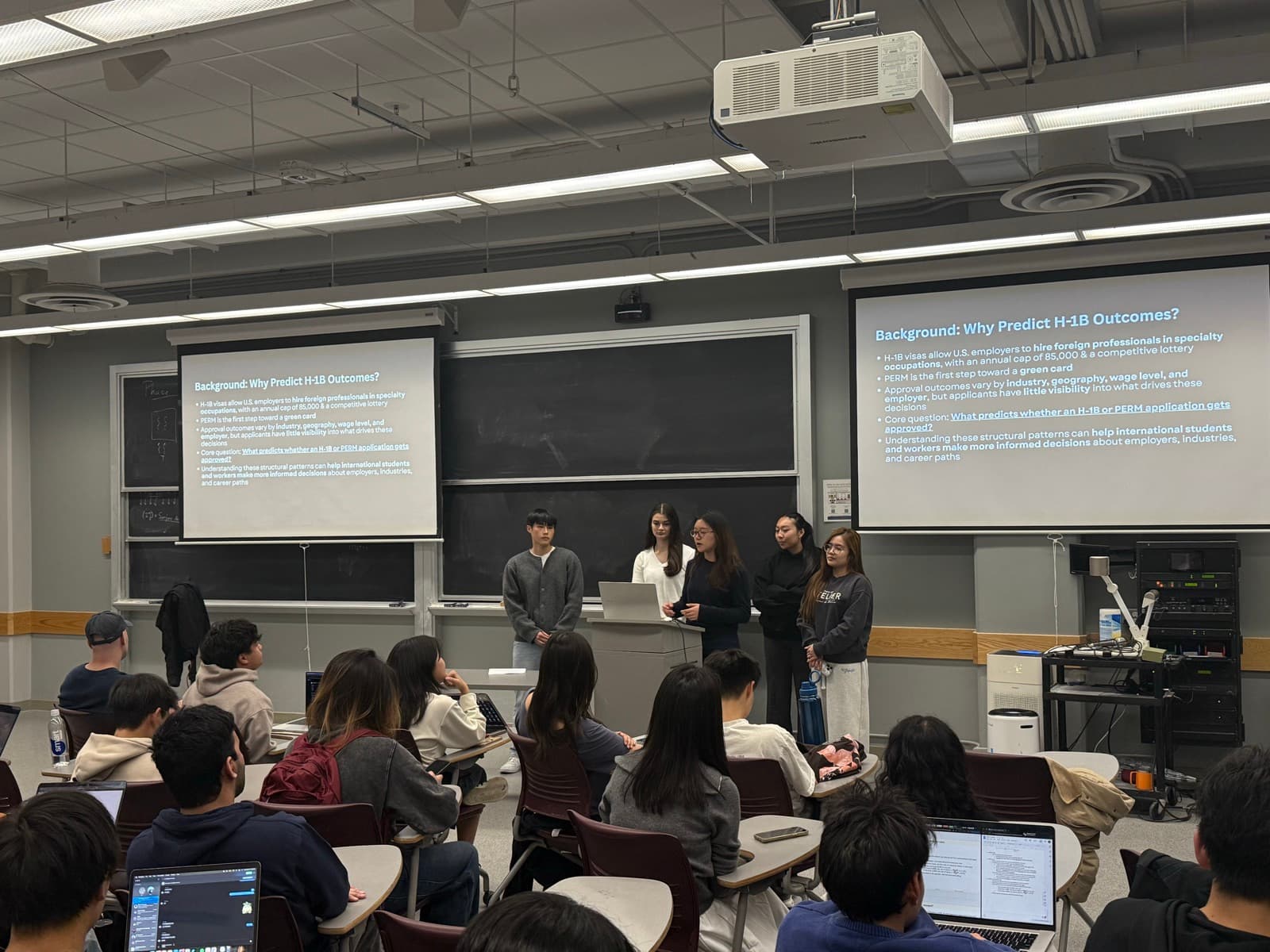 DeCal students presenting their final project to the class in a Berkeley lecture hall